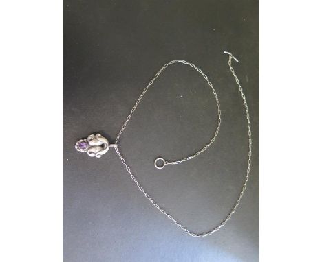 Georg Jensen amethyst pendant on chain, no 28, pendant 3.5cm wide, chain 59cm long, generally good condition some bending to 