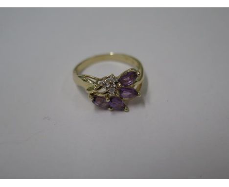 A pretty 14ct yellow gold Amethyst and diamond floral spray ring, size O, marked 14K, approx 3 grams, in good condition 