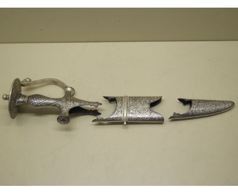 A decorated sword hilt and scabbard top and tip 