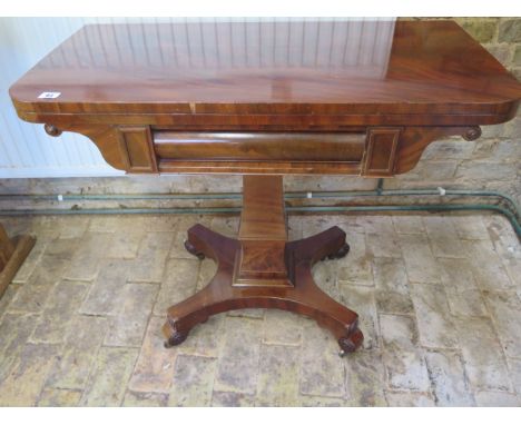 A 19th century mahogany fold over card table, 74 cm tall x 88cm wide, some general wear and fading but a usable table 