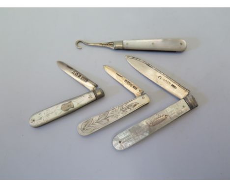 A Georgian Silver and Mother of Pearl Handled Fruit Knife, two later and button hook