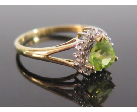 A 9ct Gold Peridot and Diamond Ring, size O