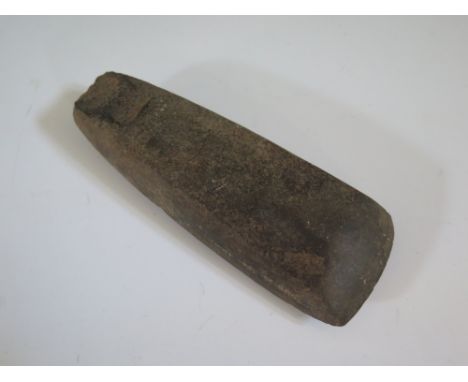 A Neolithic Axe Head, found in Exmouth, 15 cm