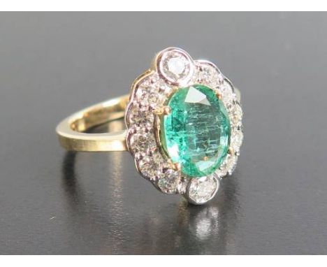 An Emerald and Diamond Cluster Ring, size L.5