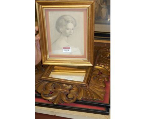 A circa 1900 pencil sketch portrait of a lady; a reproduction wall mirror; religious print; and two other prints (5)