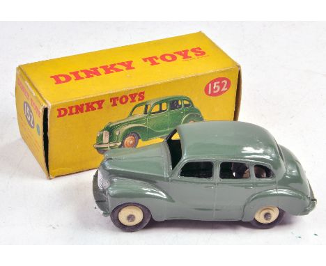 Dinky No. 152 Austin Devon. Green with light fawn hubs. Generally very good to excellent. Little or no sign of wear in fair b