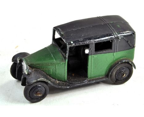 Dinky No. 37g Austin Taxi with two-tone green and black including interior, base and ridged hubs. Silver trim. Very good with