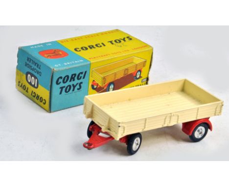 Corgi No. 100 Dropside Trailer in cream and red with spun hubs. Generally very good, some specks of wear in good to very good