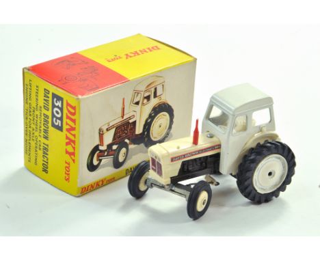 Dinky No. 305 David Brown 990 Tractor. Charcoal engine block and white hubs. Great example appears very good to excellent, li