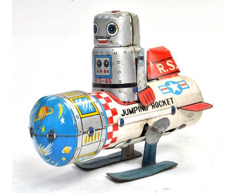 Yoneya Japanese Vintage Tin Plate Mechanical 'Jumping Rocket'. Some light wear otherwise very good and in working order.