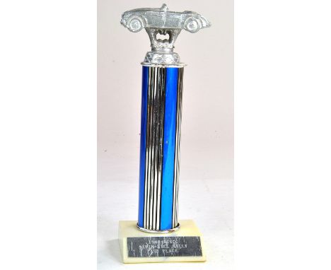 Awards Trophy depicting model of an Austin Healey.  Condition Reports: Please contact us for additional pictures and/or enhan