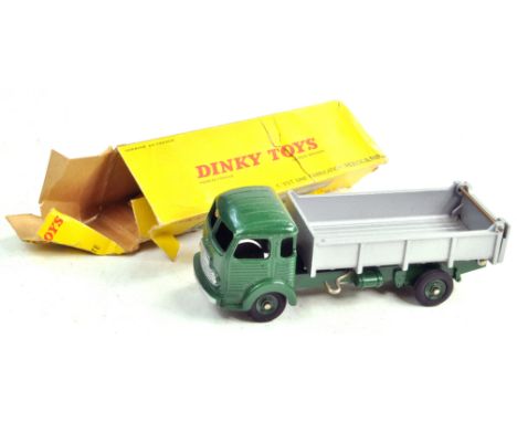 French Dinky No. 33b Simca Tipper in dark green. Generally very good to excellent with fair box. Condition Reports: Please co
