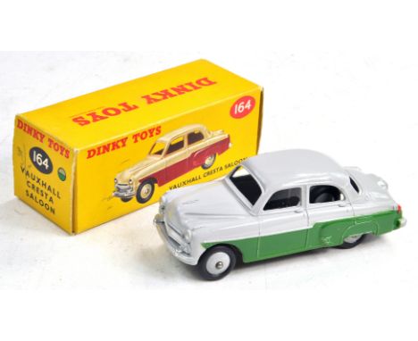 Dinky No. 164 Vauxhall Cresta Saloon. Model is in two tone green and grey,  silver trim including grey ridged hubs with black