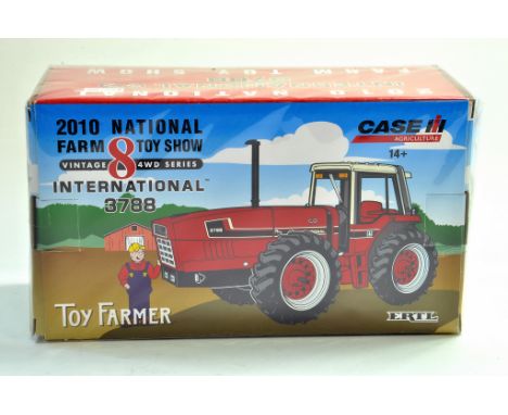 Ertl Farm issue comprising 1/32 National Farm Toy Show 2010 Limited Edition - International 3788 Snoopy Tractor. Appears exce