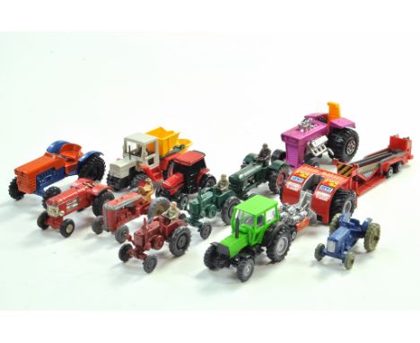 An interesting collection of twelve small scale tractor issues from various makers. Generally good to excellent.  Condition R