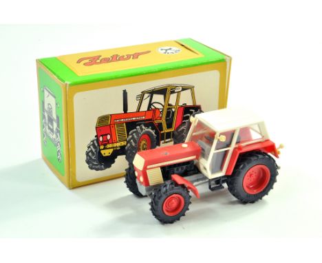 IGRA Plastic Issue small scale Zetor Crystal Tractor. Exhaust needs reattaching, otherwise very good in original box. Conditi