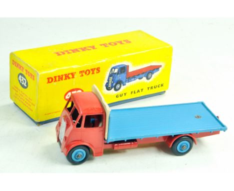 Dinky No. 432 Guy Flat Truck with red cab and chassis, light blue back and hubs with smooth tyres. A great example, generally