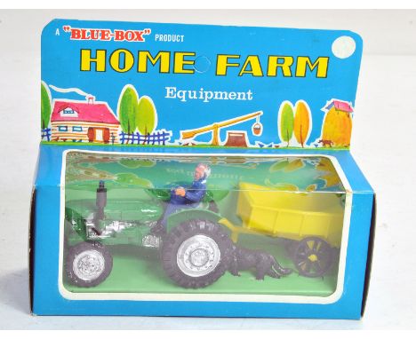 Blue-Box Hong Kong Plastic Corgi Copy of Fordson Major Tractor in green with trailer. Excellent in very good to excellent box