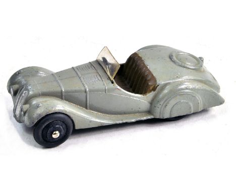 Dinky No. 38a Frazer Nash with grey body, brown seats and black ridged hubs. Very good with several specks of wear. Condition