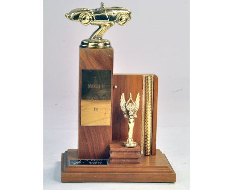 Awards Trophy depicting model of an Austin Healey in gold. Condition Reports: Please contact us for additional pictures and/o