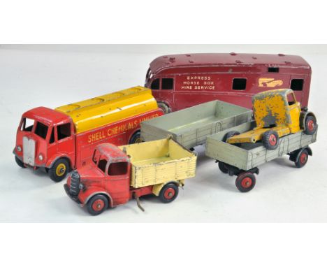Group of Dinky diecast commercials comprising Horsebox, Shell Tanker and others. Generally worn, hence fair to good. Conditio