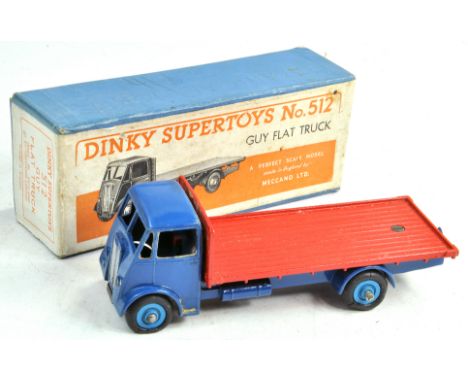 Dinky No. 512 Guy (Type 1) Flat Truck with blue cab and chassis, red back, silver trim, mid blue hubs and metal tow hook. Wou