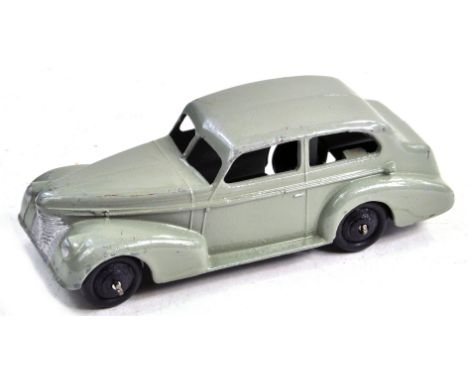 Dinky No. 39b Oldsmobile with mid-grey body, silver trim and black ridged hubs. A great example, generally very good almost e
