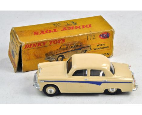 Dinky No. 176 Austin Saloon in cream with blue flash. Silver trim including additional superdetails. Appears very good to exc