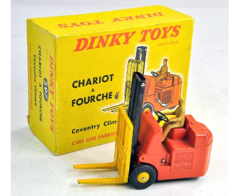 French Dinky No. 597 Coventry Climax Forklift Truck in burnt orange with black mast, yellow forks and hubs. Generally good to