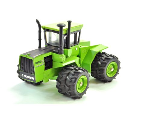 Ertl Farm issue comprising 1/32 Steiger Panther Tractor. Generally good. Condition Reports: Please contact us for additional 