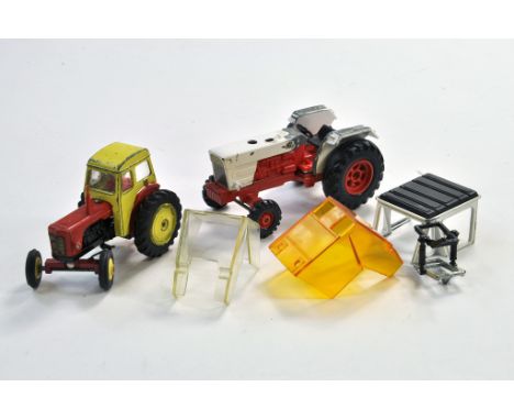 Dinky David Brown 990 Tractor in harder to find red and yellow, albeit with wear plus Corgi David Brown custom project. Condi