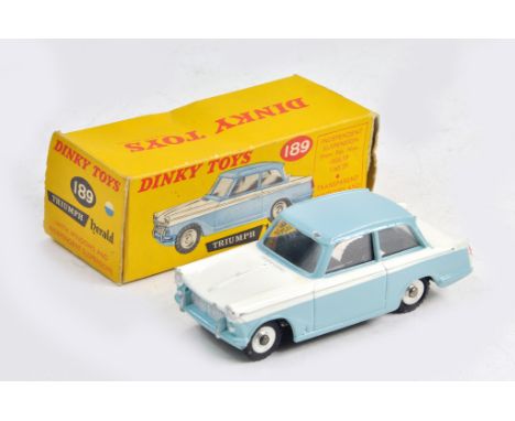 Dinky No. 189 Triumph Herald in two-tone white and light blue with silver trim and chrome spun hubs. Generally very good, a f