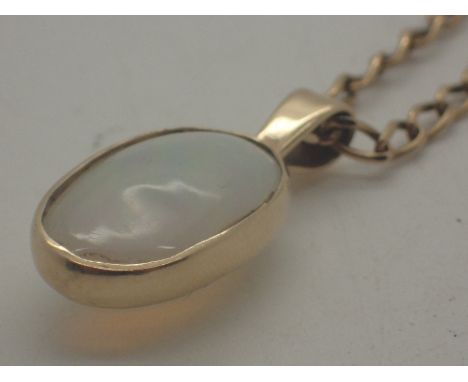 9 ct gold large gold mounted opal on a 9 ct gold chain, total weight 11.0 g, chain weight 6.8 g
