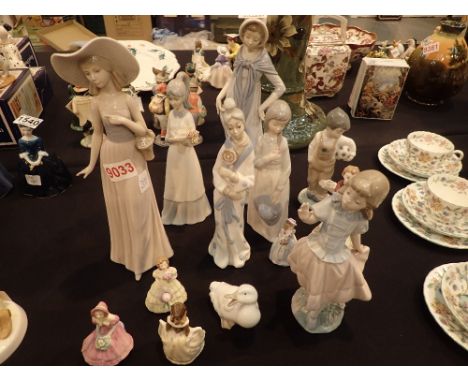 Collection of Nao and Coalport figurines