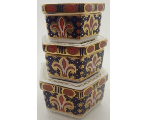 Three boxed graduated Royal Crown Derby hexagonal trinket boxes