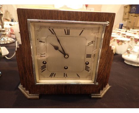Garrard Westminster chime oak cased Art Deco clock with key and pendulum and a Boodle & Dunthorne 1980s insurance valuation f