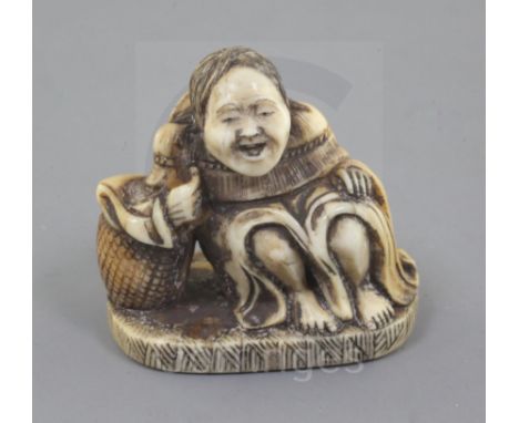 A Japanese ivory netsuke of Shojo, Meiji period, signed Ryumin, seated, resting on a barrel, h. 3.3cm