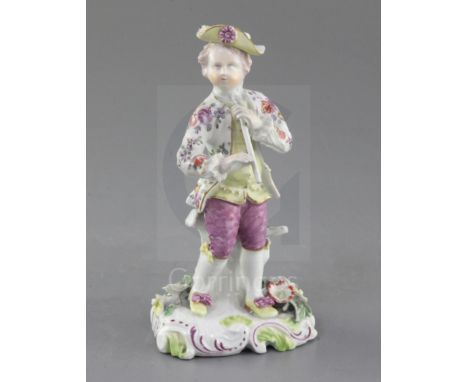 A Derby 'Pale Family' figure of a piper, c.1758, wearing a flower painted jacket and holding a pipe, on a flower encrusted ro