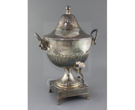 A George III silver two handled tea urn and cover by Andrew Fogelberg &amp; Stephen Gilbert, engraved with the Heneage family