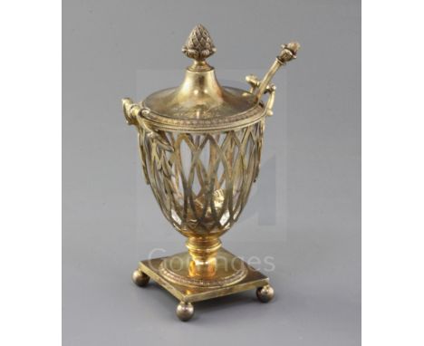 A George V silver gilt two handled sugar vase and matching sifter spoon, by Mappin &amp; Webb, of vase form, with pierced wir