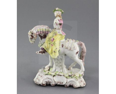 An extremely rare Girl-on-a-Horse or Compass Marked group of a young lady riding a piebald horse, c.1755, the figure wearing 