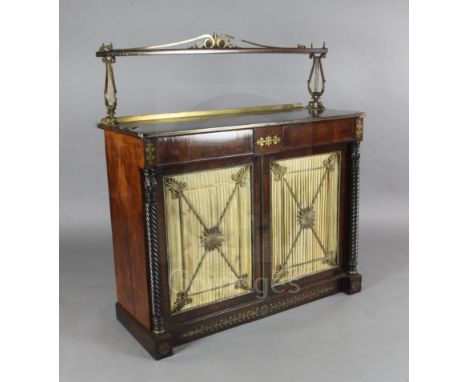 A Regency brass inset rosewood chiffonier, with single raised shelf supported by cast ormolu lyre shaped supports over two dr