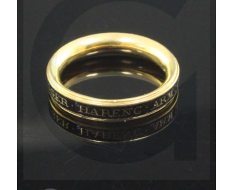 An early George III gold and black enamel mourning band, inscribed "Roger Harenc Arm Ob. 10 June, 1763, Ae 72", size I.