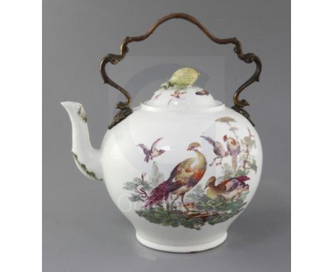 A rare and important Derby punch kettle and cover, c.1760-5, with original wicker bound ormolu arched handle, finely painted 