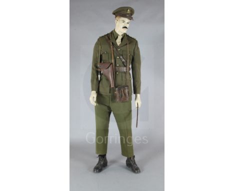 A WWI Royal Field Artillery officer's dress uniform and accessories, on a mannequin, of the type worn by 2nd Lieutenant Richa