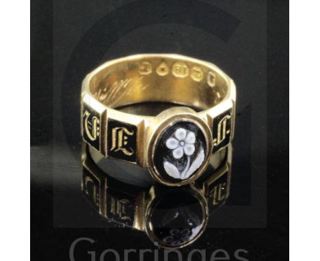A William IV 18ct gold, black enamel and hardstone set mourning ring, inscribed "Willm Rooke Esqr Ob 22nd Febry 1833 aet 82",