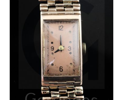 A lady's gold Moeris manual wind wrist watch on a 14k gold bracelet, the rectangular copper coloured dial with Arabic and dot