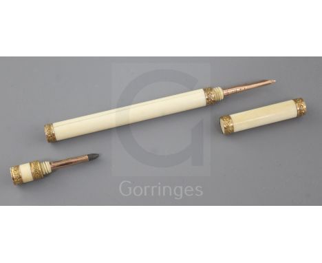 A rare 19th century French gold mounted marine ivory combination pen/pencil, 5.25in., housed in a red leather case