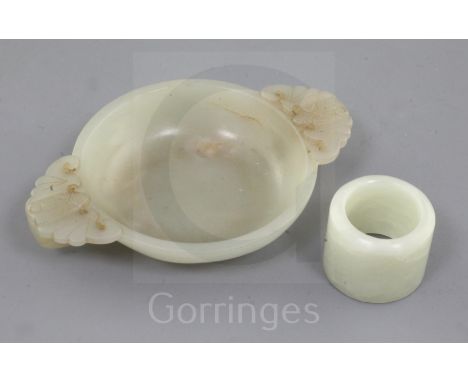A Chinese pale celadon jade small brush washer and an archer's ring, 2.7cm and 10.2cm