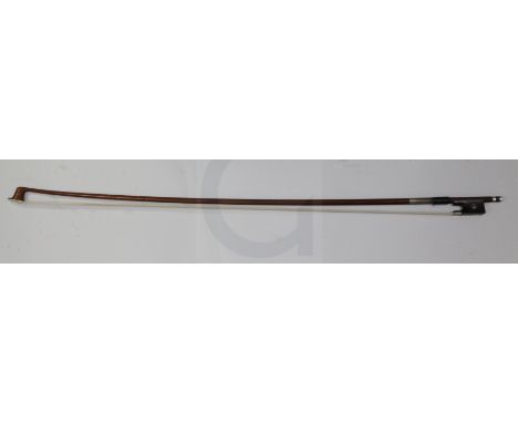 A German nickel mounted violin bow, stamped W E Dorfler, the stick rounded, with mother-of-pearl inset ebony frog, 64g